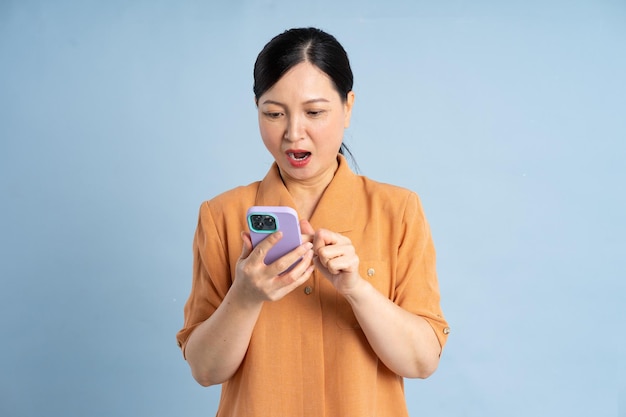 Portrait of an elderly woman using a smartphone