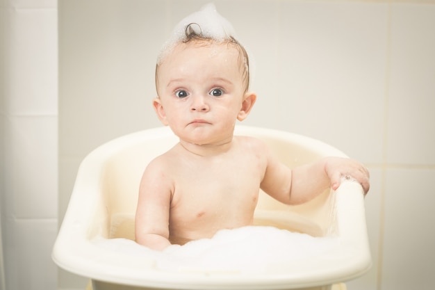 Portrait of energetic cute toddler