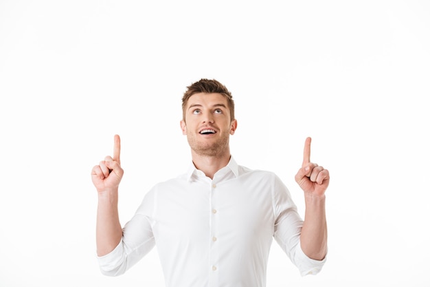 Portrait of an excited young man looking at camera