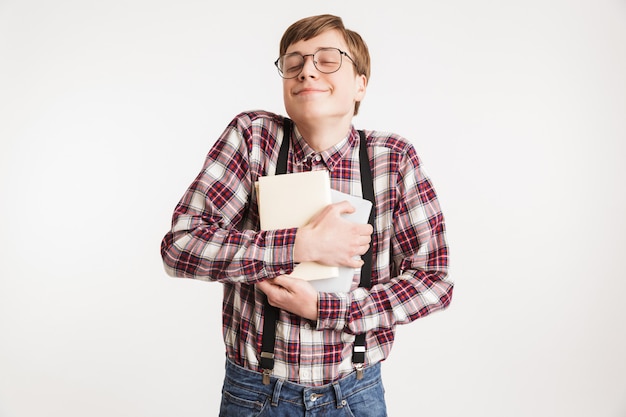 Portrait of an excited young school nerd guy