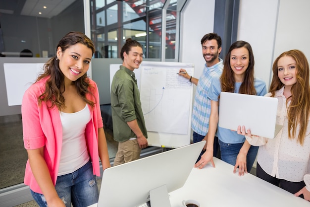 Portrait of executives working in conference room