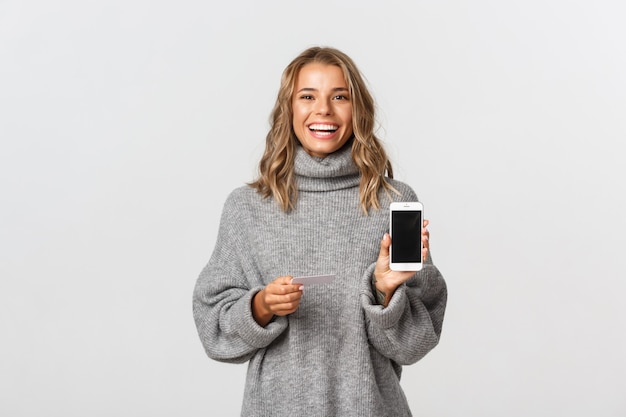 Portrait expressive young woman with mobile