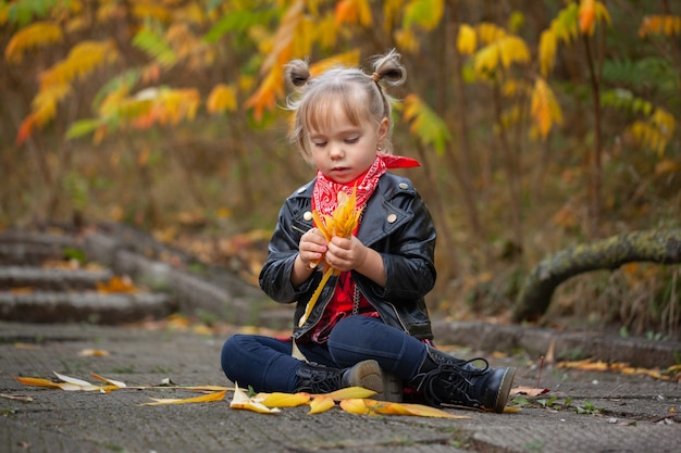 Portrait fashion cute smile child girl having fun outdoors.