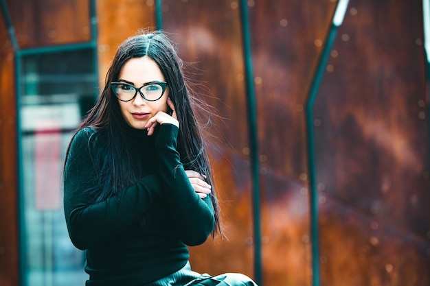 Portrait of fashion model woman wearing eye glasses