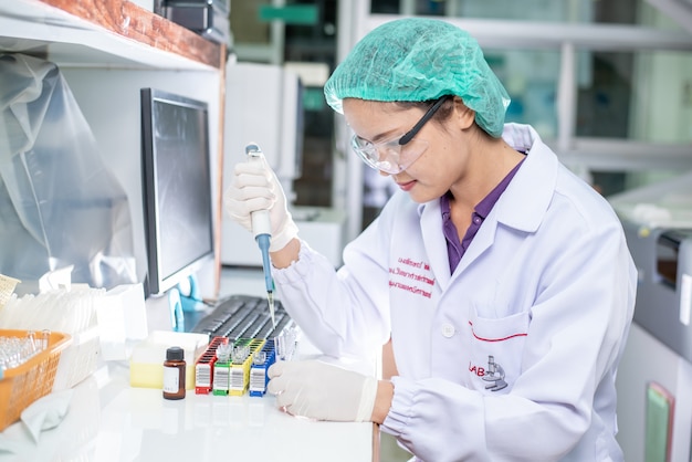 Portrait of a female researcher working in a lab 