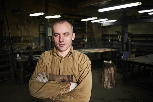 Portrait of a forge in the workshop