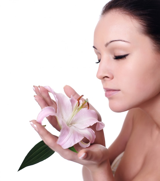 Portrait of Fresh and Beautiful woman with flower isolated on white