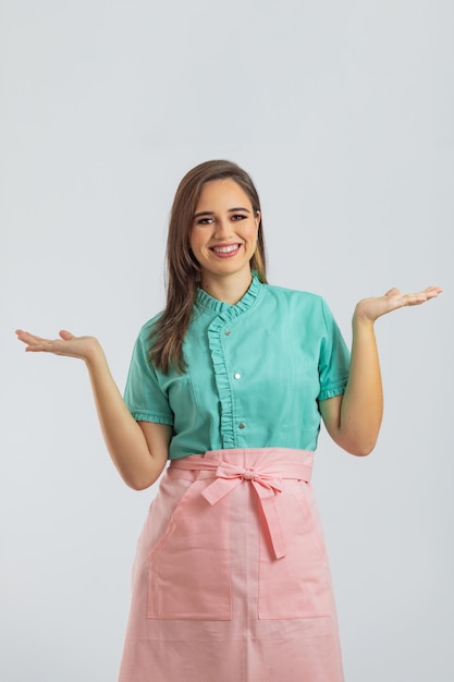 Portrait of friendly smiling professional confectioner on an isolated background