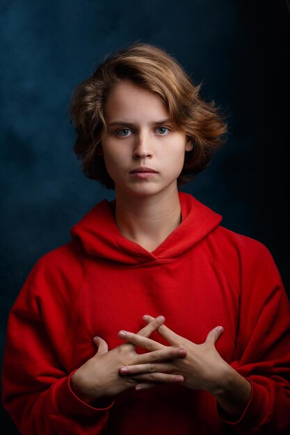 Portrait of a girl closeup on a blue background