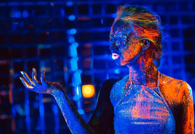 Portrait of a girl painted in fluorescent powder.