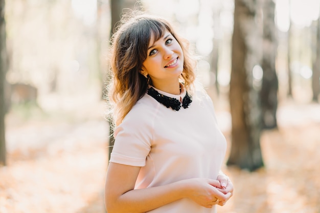 Portrait of a girl in the Park in autumn