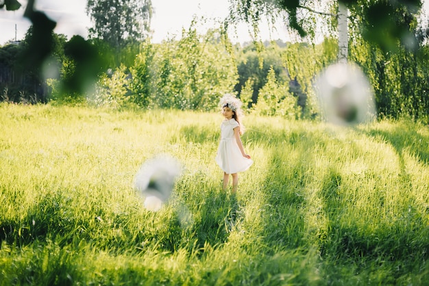 Portrait of a girl in the summer outdoors