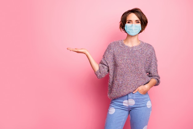 Portrait of girl wear safety mask hold palm copy space medicine therapy