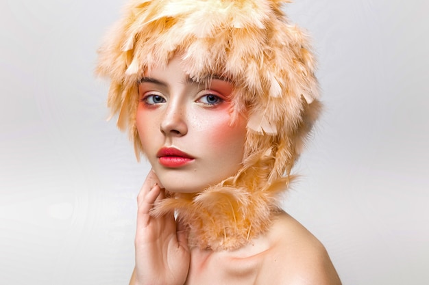 Portrait of a girl with fashion makeup in studio