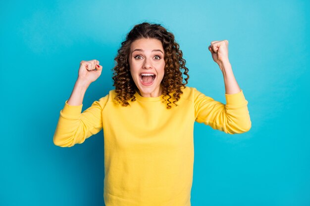 portrait of glad amazed girl good great news reaction meet friend isolated on blue color background