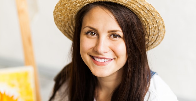 Portrait of gorgeous woman artist  at studio