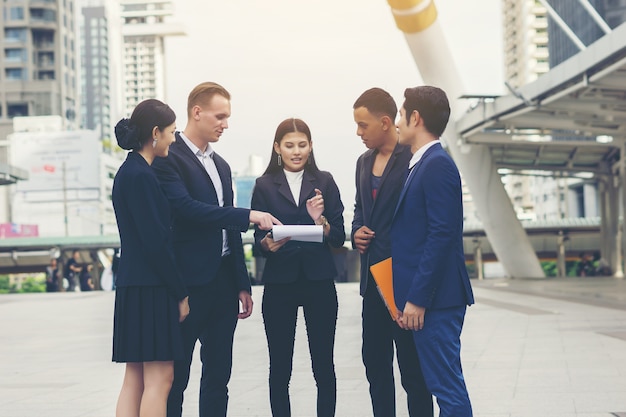 Portrait Group of business people conversation at meeting outside. Business concept.