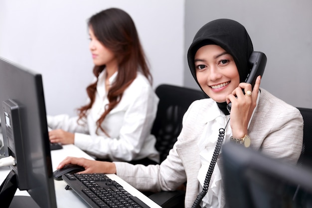 Portrait of a group of businesswomen meeting at office