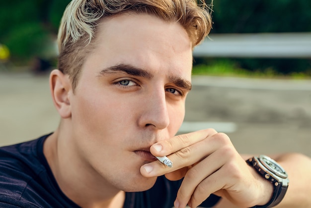 portrait of a guy sitting on a motorcycle