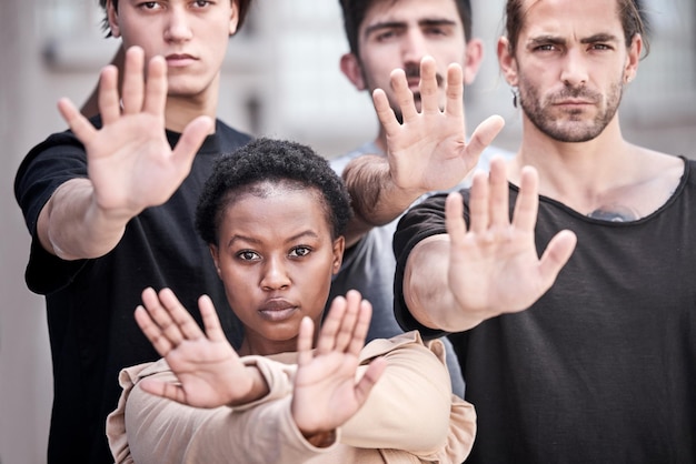 Photo portrait hands and protest in city with stop decision making and choice with gesture for peace community solidarity and group of people in teamwork activism and support against racism in rally