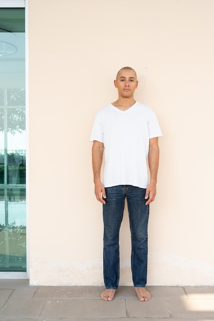 Portrait of handsome bald man wearing tshirt