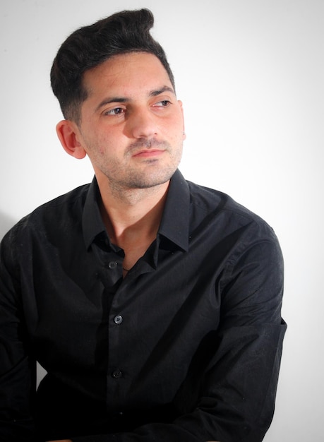 Portrait of handsome man in casual style looking at camera and smiling