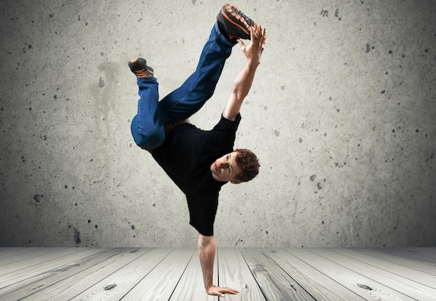 Portrait of handsome young man dance