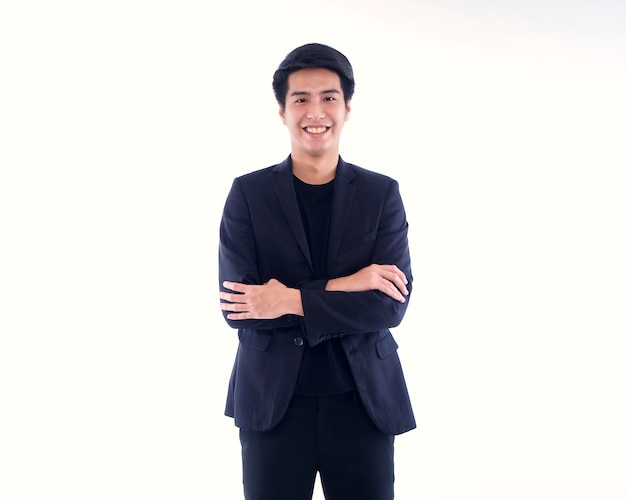 Portrait of handsome young man smiling on white wall