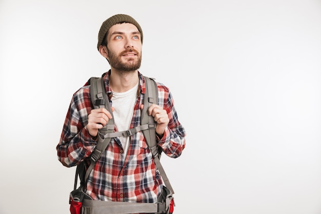 Portrait of a happy bearded man in plaid shirt