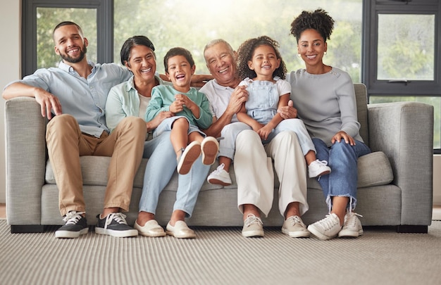 Portrait of happy big family relax on sofa during annual reunion with grandparents parents and children Love bond fun and Brazil people lounge on living room couch and enjoy quality time together