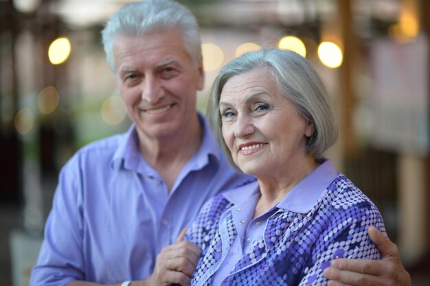 Portrait of a happy elderly couple embracing