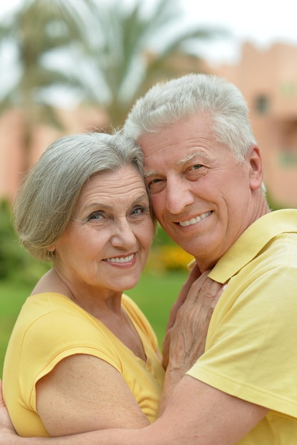 Portrait of a happy elderly couple embracing