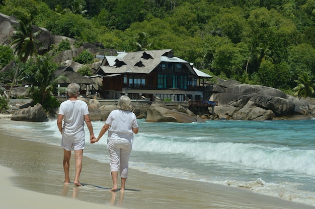 Portrait of a happy elderly couple walking