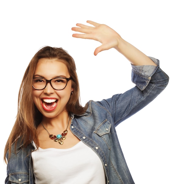 Portrait of happy excited woman celebrating her success.