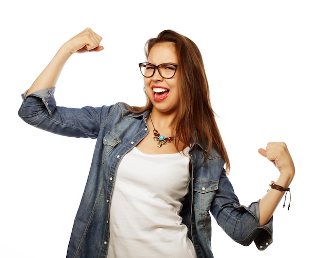 Portrait of happy excited woman celebrating her success