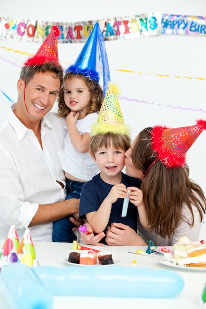 Portrait of a happy family during a birthday party