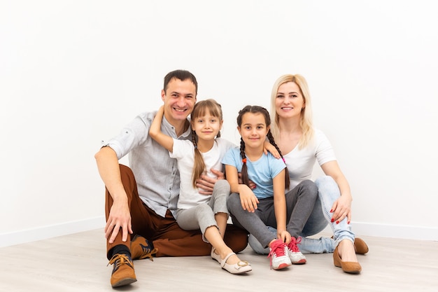 Portrait of a happy family smiling at home