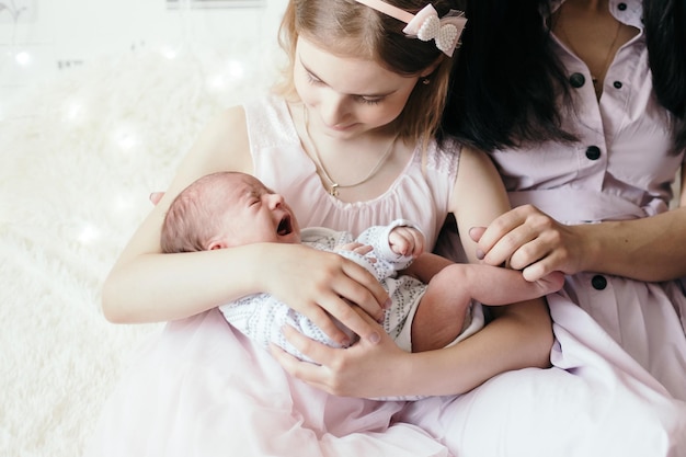 Portrait of a happy family with three children