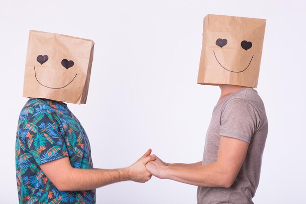 Portrait of a happy gay love couple on white background