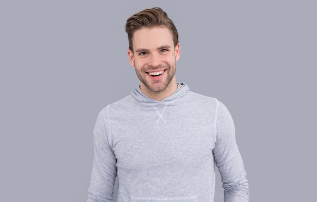 Portrait of happy man Smiling man studio Young man with unshaven face Handsome man in casual