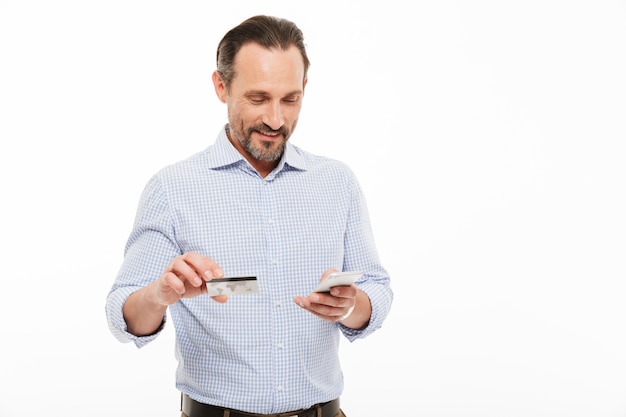 Portrait of a happy mature man dressed in shirt