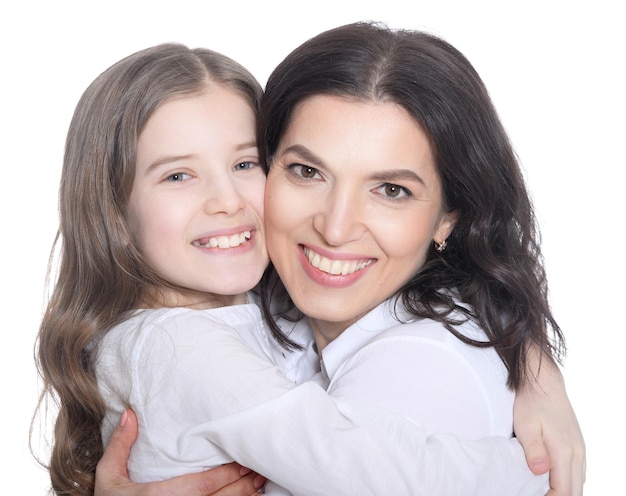 Portrait of a happy mother with her daughter on a white background