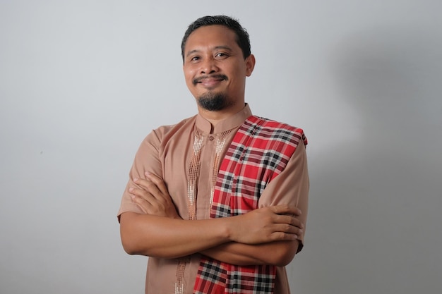 Portrait of happy muslim man isolated in white background