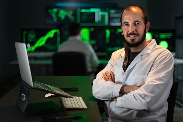 Portrait of happy scientist doctor wearing white coat in the office looking at camera Copy space Science and technology concept