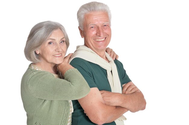 Portrait of happy senior couple embracing