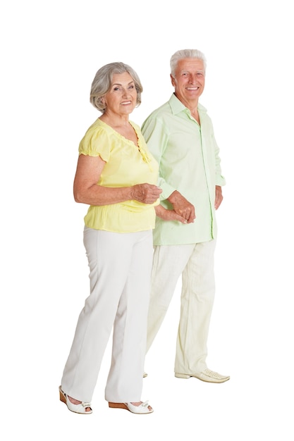 Portrait of a happy senior couple at white background