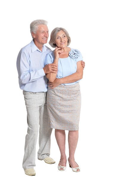 Portrait of happy senior couple on white background