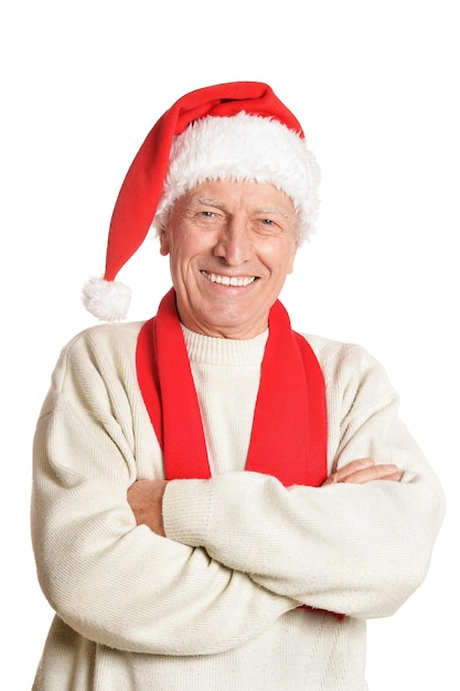 Portrait of happy senior man in Santa hat isolated