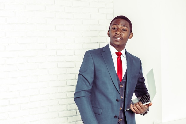 Portrait of happy, smiling black business man