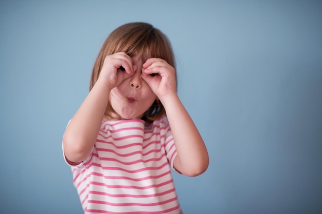 portrait of happy smiling child at home while playing